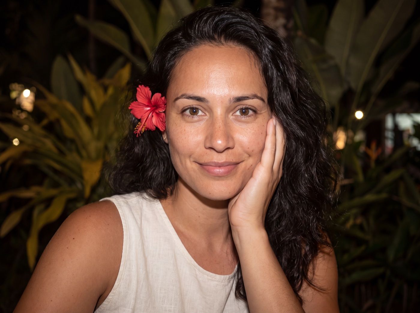 A sample portrait lit by direct flash at night